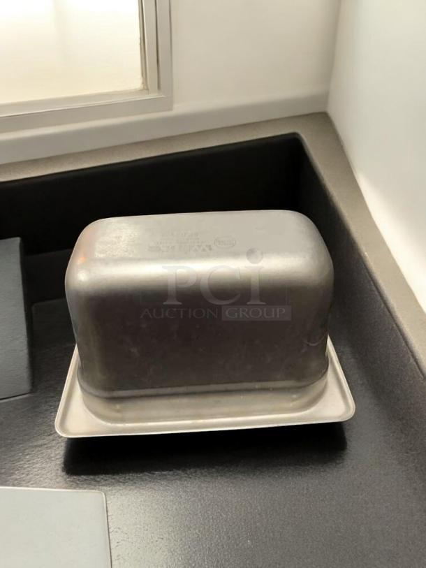Stainless steel 1/9 size, 6" deep food pan in excellent condition, NSF certified, compatible with Vollrath, Winco, Cambro.