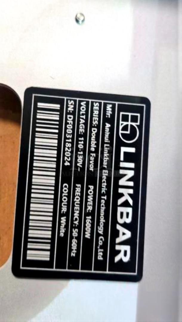 Alt text: Label on Linkbar Double Favor espresso machine, showing model, voltage 110V, power 1600W, and color white.