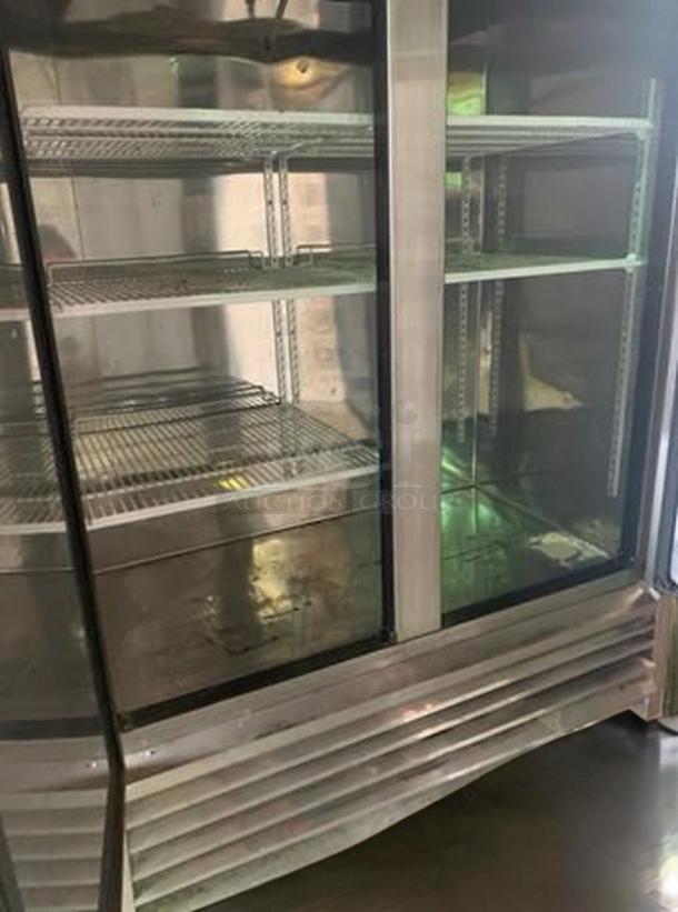 Kool-It KBSF-2 two-door reach-in freezer, outstanding condition, stainless steel, fully tested, shelves visible.