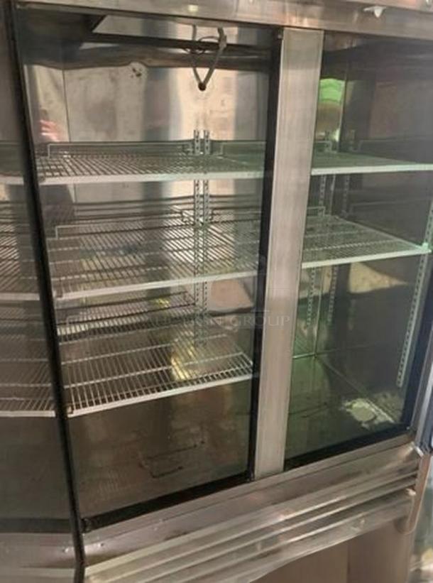 Kool-It KBSF-2 two-door reach-in freezer in outstanding condition, 115V, MVP Group, glass doors, wire shelves, fully tested.