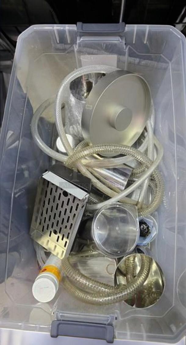 Components of Anhui Linkbar Double Favor espresso machine, including hoses and metal parts, in a storage bin.