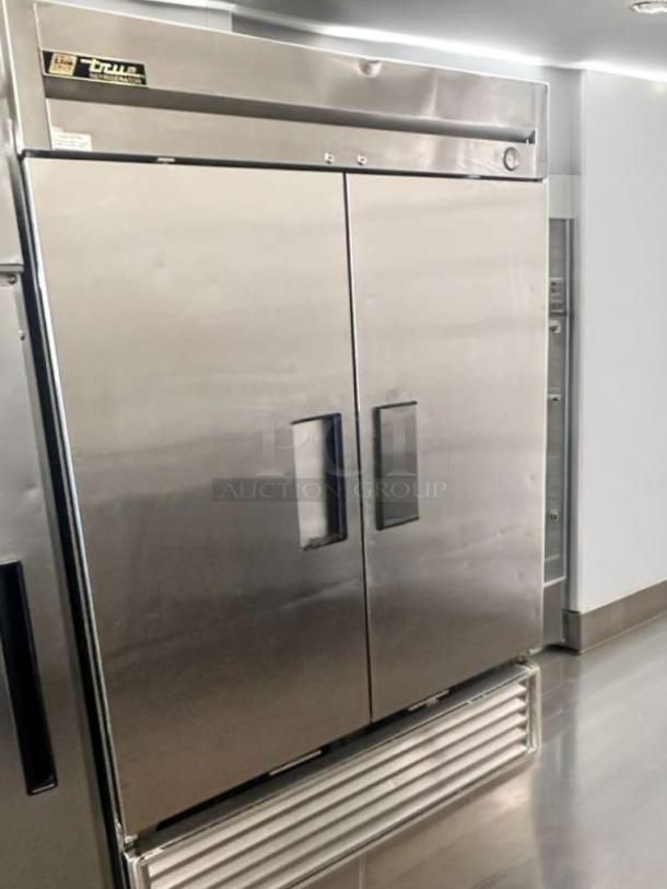 True T-49 two-door reach-in refrigerator in superb condition, stainless steel, 115V, tested and working, model label visible.