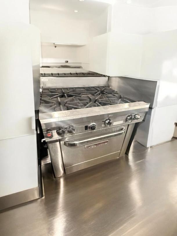 Southbend S36D 6-burner gas range with oven, natural gas, outstanding condition, fully tested, stainless steel finish.