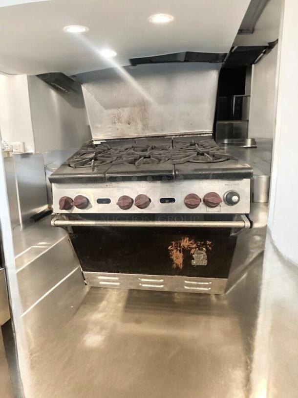 Imperial IR-6 gas range, 6 burners, standard oven, great condition, fully tested, natural gas, visible signs of light wear.