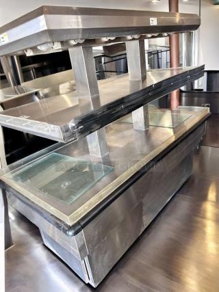 Royston 2HF-72-SS 72" two-tier hot food island merchandiser with dual heat lamp display, stainless steel, excellent condition.