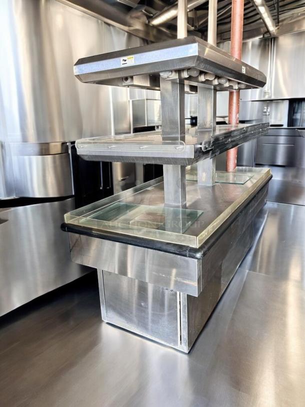 Royston 2HF-72-SS, 72" two-tier hot food merchandiser with dual heat lamps, stainless steel, excellent condition, fully tested.