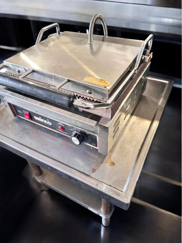 INCO EPG-1C single panini grill in superb condition, 120V, fully tested. Features robust design with durable metal finish.
