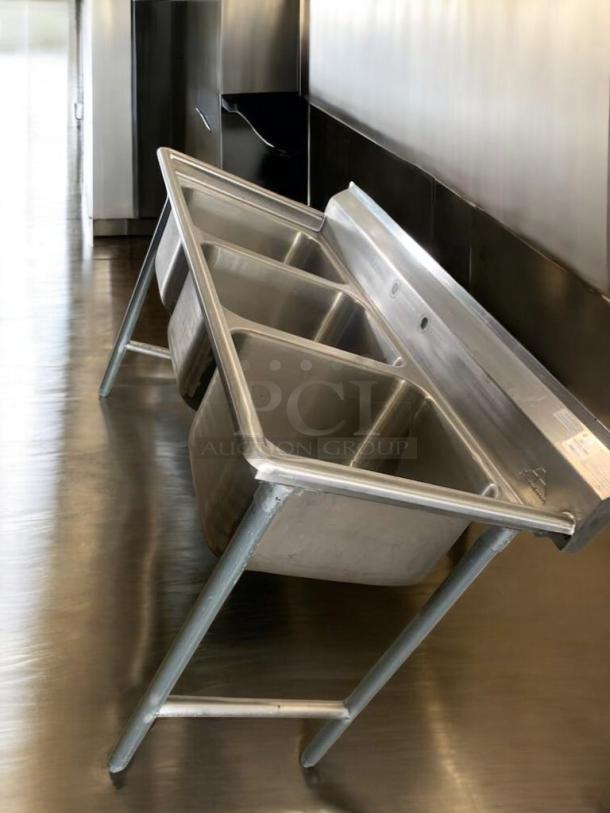 Advance Tabco T9-3-54 stainless steel 3-compartment sink in superb condition. NSF certified and fully tested.