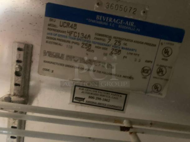 Beverage-Air UCR48 undercounter refrigerator label, detailing model, refrigerant type HFC134A, voltage, and design pressure.