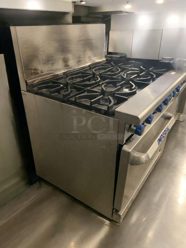 Imperial IR-6 gas range with 6 burners and standard oven, in outstanding condition. Blue knobs, stainless steel finish, natural gas.