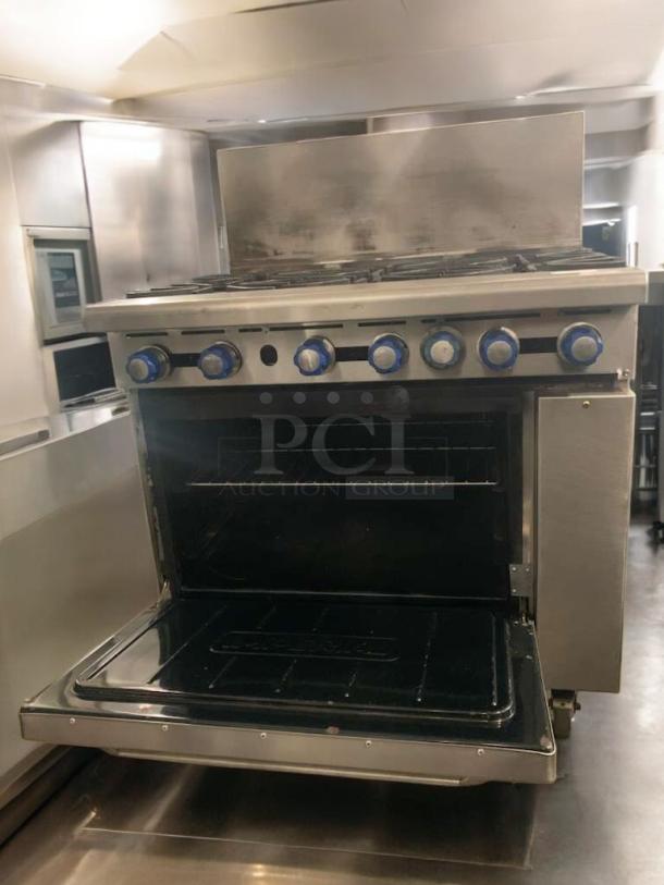 Imperial IR-6 gas range with 6 burners, standard oven, tested and working, natural gas, excellent condition.