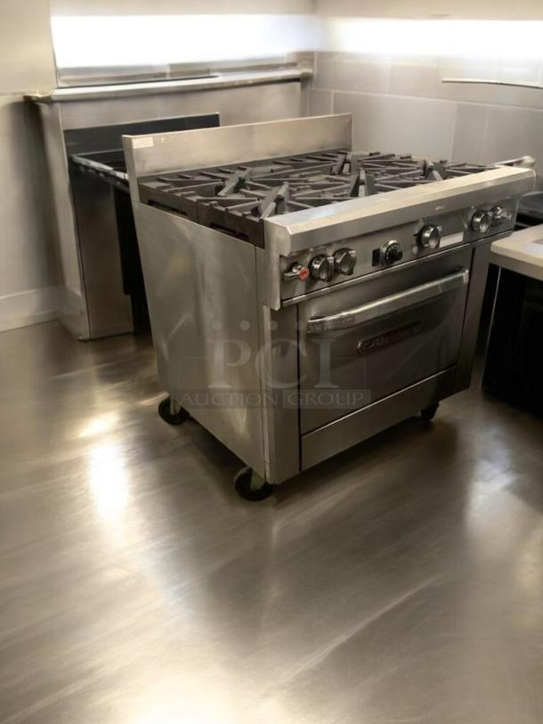 Southbend 4361D 6-burner gas range with oven, superb condition, fully tested, stainless steel, natural gas, on casters.