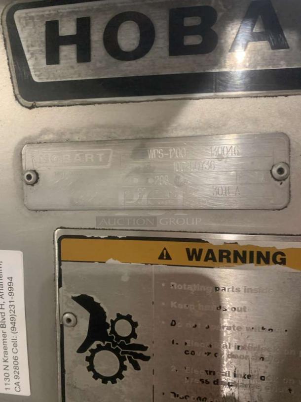 Hobart WPS-D00 planetary mixer label showing brand and model details, 208V, in excellent condition.