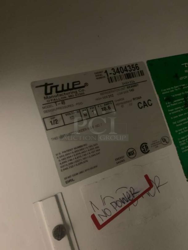 Label of True T-49 Two-Door Refrigerator. Shows model, voltage (115V), energy rating, and NSF certification. Marked "No Power."