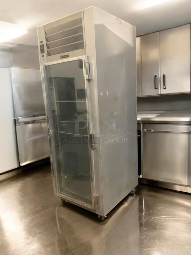 Traulsen G11010 single glass door reach-in refrigerator in immaculate condition; fully tested and working, 115V.