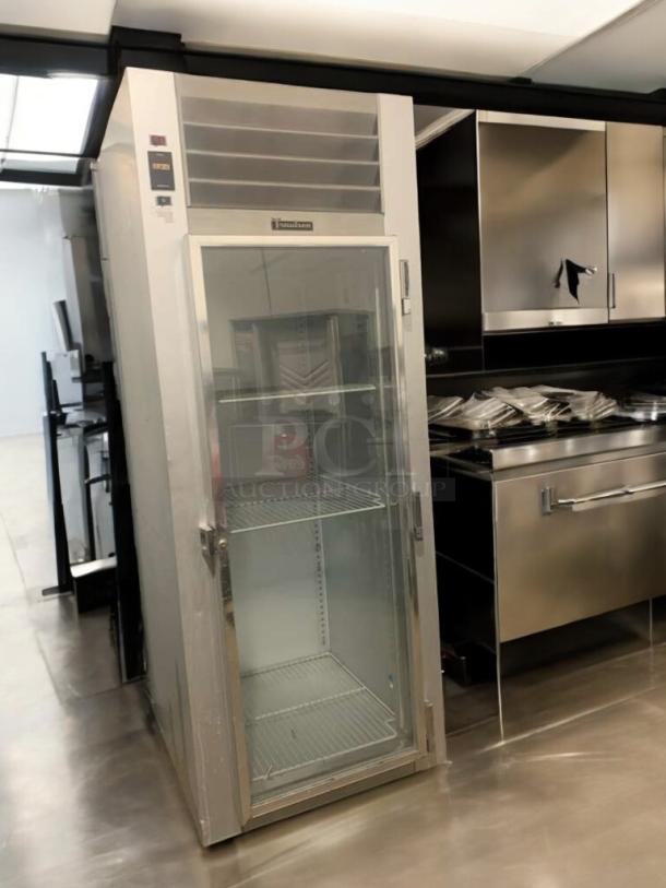 Traulsen G11010 single glass door refrigerator, immaculate condition, 115V, fully tested, in stainless steel finish.
