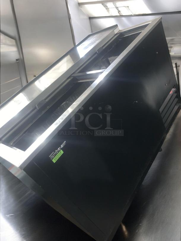 Turbo Air TBC-50SB-N6 bottle cooler, 50", pristine condition, stainless steel top, side vents, label indicates 115V, fully tested.