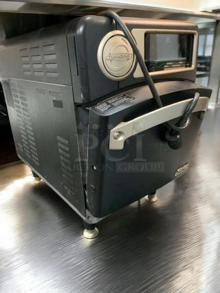 Immaculate Turbochef NGO rapid cook oven, 208/240V, fully tested, black exterior, minimal wear, working condition.