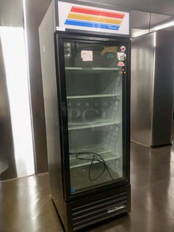 Pristine TRUE GDM-23 glass door merchandiser refrigerator, 115V, excellent condition, fully tested, branded stickers on door.