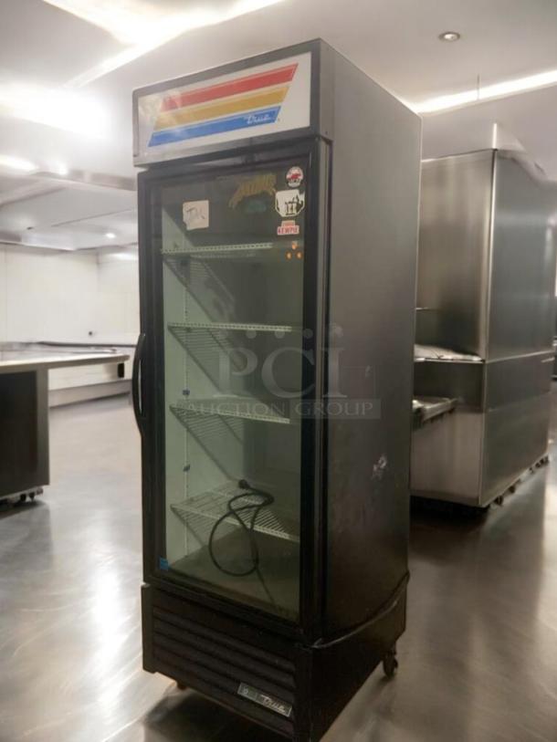 Pristine True GDM-23 glass door merchandiser refrigerator, 115V, fully tested, excellent condition, with visible brand label.