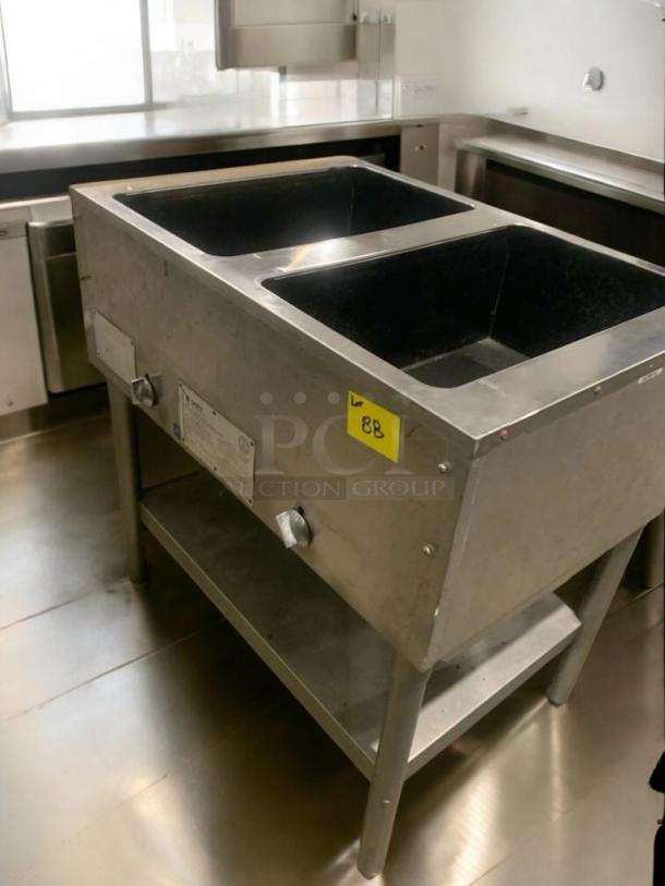 Eagle Waterless Hot Food Table, double well, gas, prime condition, stainless steel, model number visible, fully tested.