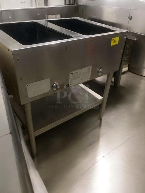 Eagle Waterless Hot Food Table, double well, gas, prime condition, fully tested, metal construction, visible model label.