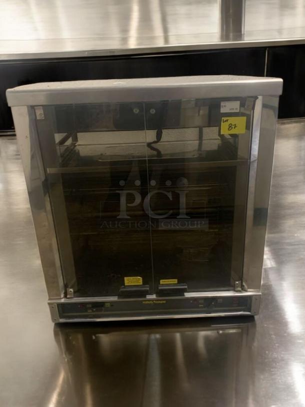 Electric countertop rotisserie in pristine condition, 2-spit capacity, fully tested. Visible label indicates Lot 87.