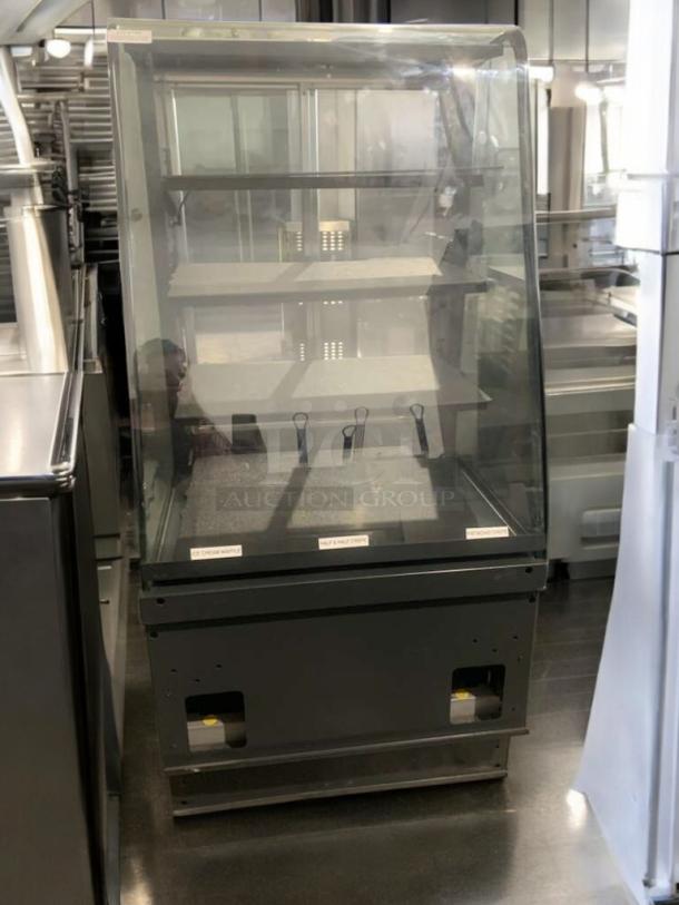 Pristine heated display case, full-view glass merchandiser. Tested, working, with shelves and visible control panel.