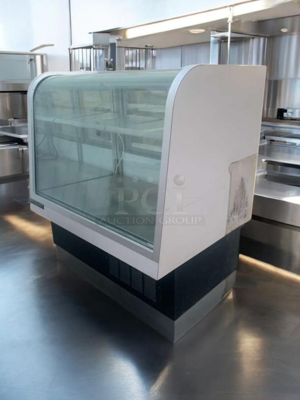Schmidt EHD-4 refrigerated display case, peak condition, glass front, spacious interior, 115V, fully tested and working.