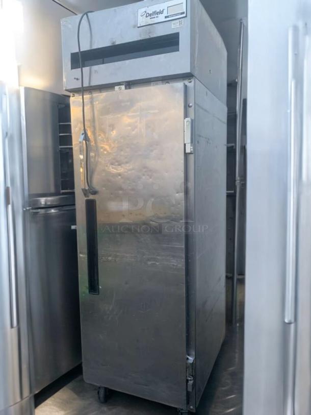 Delfield 6025XL-S single door reach-in refrigerator, prime condition, 115V, label indicates tested and working.