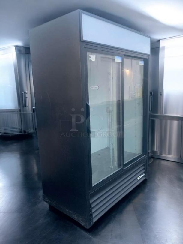 True GDM-45 commercial 2-door glass merchandiser refrigerator, 115V, prime condition, fully tested, black exterior.
