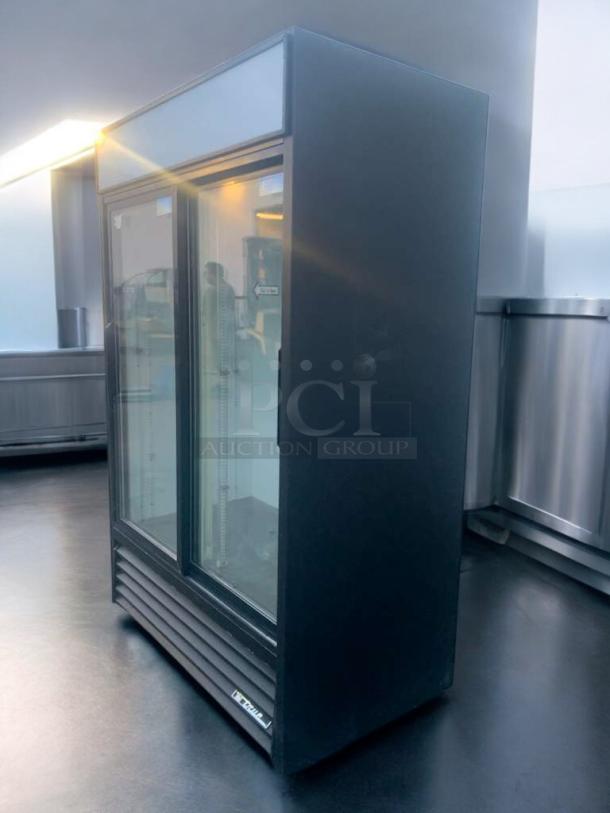 True GDM-45 2-door glass merchandiser refrigerator, prime condition, fully tested, True logo visible, 115V, USA-made.
