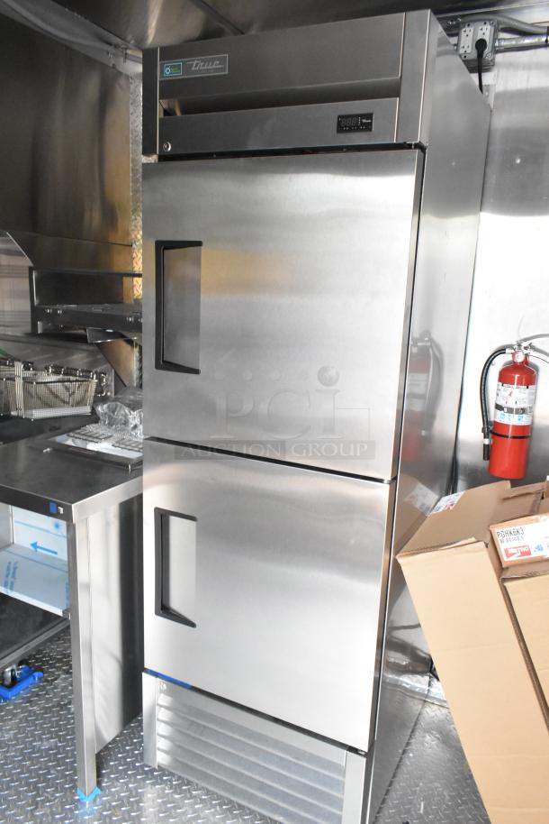 Brand new 2021 mobile kitchen trailer with True freezer, stainless steel, equipped for various concepts. Perfect condition.