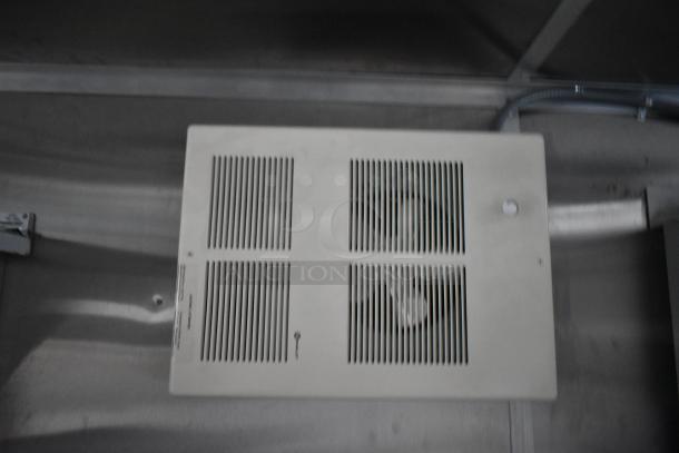 Ventilation system in a new 2021 food trailer, featuring a CaptiveAire grease hood. Perfect condition, ready for use.
