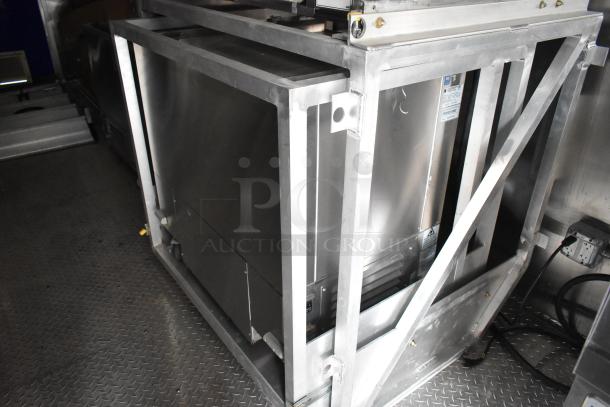 Brand new 2021 fully outfitted food trailer interior with durable flooring and appliance framework visible.