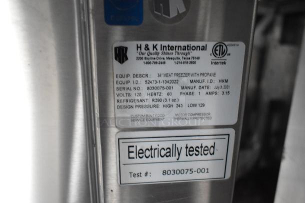 Label on H&K International meat freezer, model 52473, serial 8030075-001. Manufactured July 9, 2021. Electrically tested.