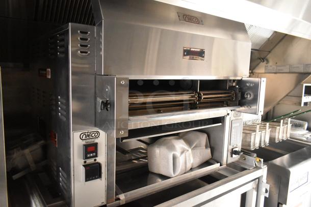 Fully outfitted food trailer with Nieco grill, CaptiveAire grease hood, fryers, freezers, and coolers. Brand new in 2021.