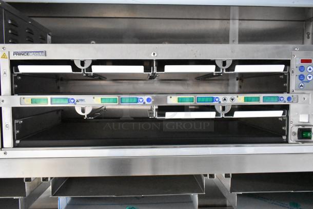 Stainless steel Prince Castle food holding bin with control buttons, part of a fully outfitted mobile kitchen from 2021.