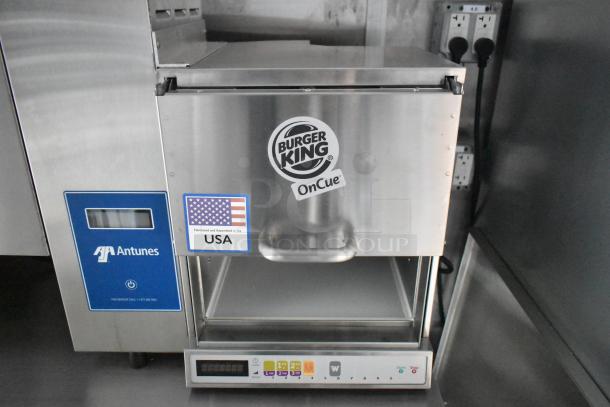 Brand new Antunes equipment inside a 2021 food trailer, featuring Burger King OnCue labeling, made in the USA.