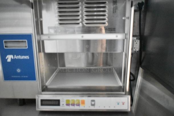 Antunes stainless steel appliance in new condition, featuring digital controls on a food trailer.