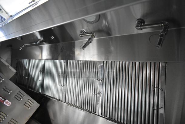 Brand new 2021 food trailer, featuring CaptiveAire grease hood and fixtures. Ideal for a ghost kitchen setup.