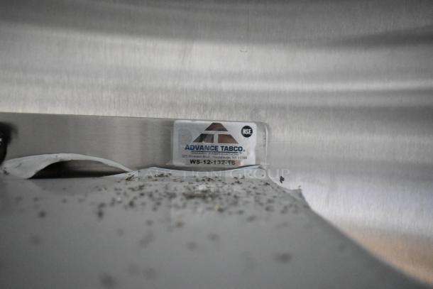 Label showing Advance Tabco, NSF-certified, model WS-12-132-16. Indicates smart fabrication, suggesting high-quality construction.