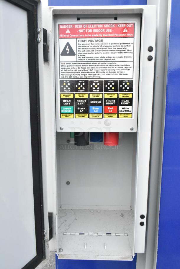 Electrical panel inside a 2021 mobile food trailer, featuring high voltage warning and labeled connection points.