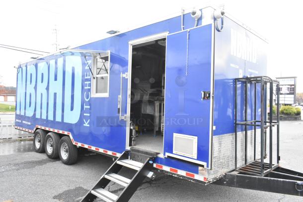 Brand new 2021 food trailer, blue exterior, with CaptiveAire hood, True freezers, cooler, sinks; perfect for various food concepts.