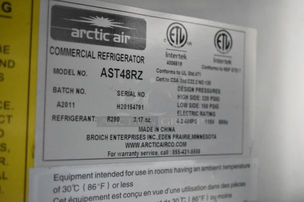 Label on Arctic Air commercial refrigerator model AST48RZ, serial H20154791, with specs including refrigerant R290.