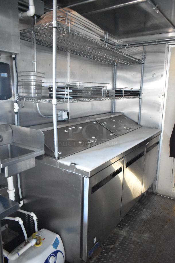 Brand new 2021 mobile kitchen trailer with CaptiveAire hood, True freezers, cooler, fryers, sinks. Ideal for ghost kitchen.