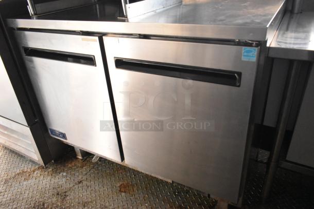 Brand new stainless steel food trailer with CaptiveAire grease hood, True coolers, and H&K fry freezers, 2021 model.