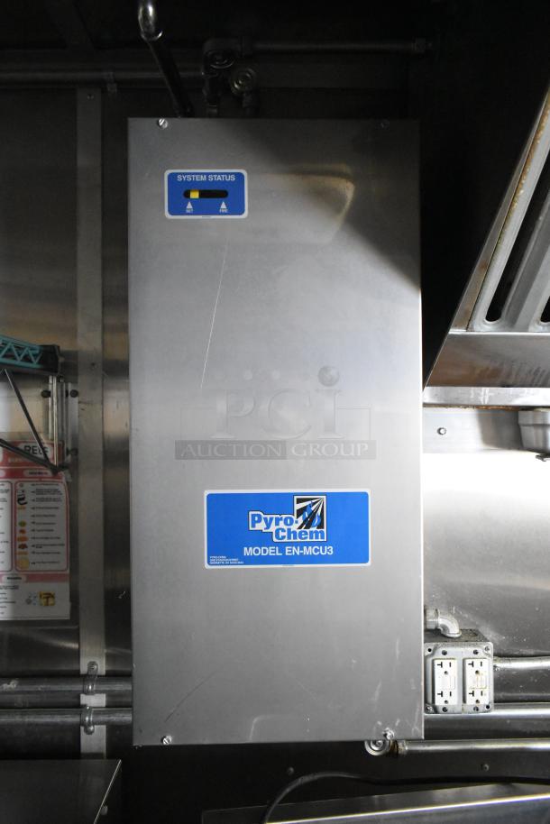 Pyro-Chem Model EN-MCU3 fire suppression system in a new 2021 food trailer. Features system status indicator.