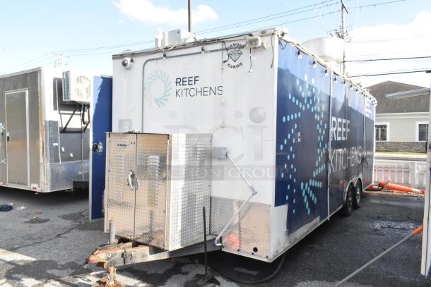 Brand new food trailer with Pyrochem grease hood, Arctic Air coolers, Pitco Frialator fryer. "Reef Kitchens" branding.