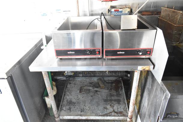 Fully equipped food trailer with Winco food warmers, showing commercial-grade condition. Includes Pitco fryer, Arctic Air appliances.